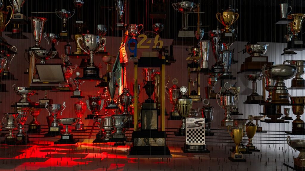 A stunning showcase of numerous motorsport trophies in Stuttgart, Germany.